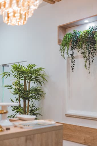 Supreme Dental Clinic logo