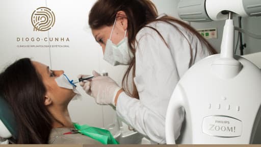 Clínica Dentária Diogo Cunha - Implantologia e Estética Oral logo