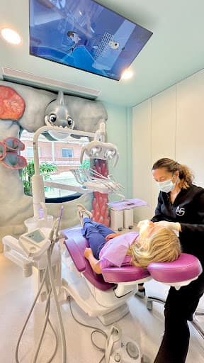 About Smiles - Clinica dentária logo