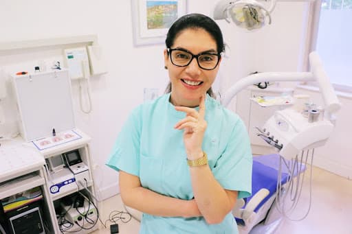 SaniDent - Clínica Dentária de Moscavide logo